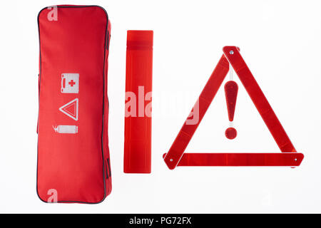 top view of red warning triangle and handbag isolated on white Stock Photo