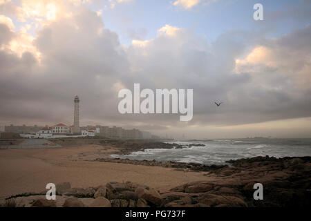 City of Leca da Palmeira in Portugal seeing lighthouse and the beach; early morning light Stock Photo