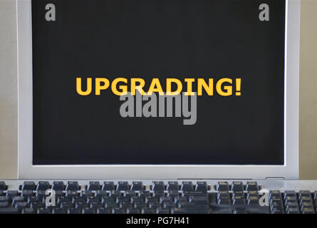 Keyboard and word Upgrading on the computer monitor Stock Photo