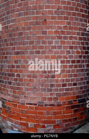 Wonderful old curved brick wall in large country house Stock Photo