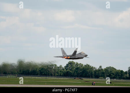Oshkosh, WI - 28 July 2018:  A F-22 from the United States Air Force takes off with full afterburners Stock Photo
