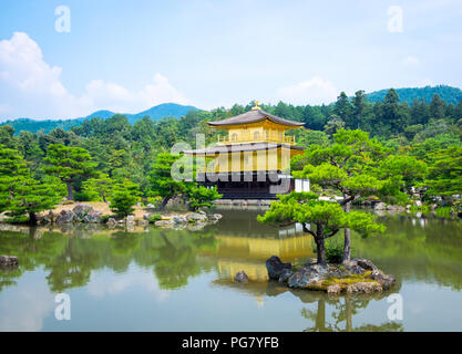 Kinkaku-ji (also known as Kinkakuji or Rokuon-ji), the Temple of the Golden Pavilion, is famous Zen Buddhist temple located in Kyoto, Japan. Stock Photo