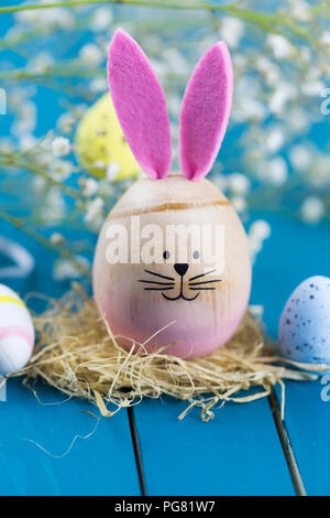 Painted Easter egg with rabbit ears Stock Photo