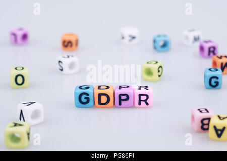 GDPR word text written on colorful cube with bokeh cube word block background Stock Photo