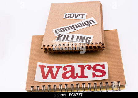 Torn Newspaper Title on a notebook Stock Photo