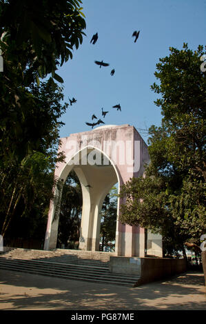 A memorial at Bahadur Shah Park or Victoria Park in Old Dhaka, Bangladesh. It is a war memorial and a tribute to the martyrs who fought in the first l Stock Photo