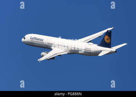 Barcelona, Spain - August 20, 2018: Lufthansa Airbus A321-100 banking left after taking off from El Prat Airport in Barcelona, Spain. Stock Photo