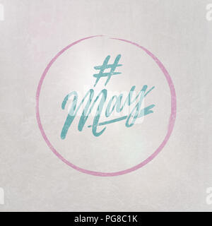 # Hashtag May written in blue on grey background as template in handwritten style Stock Photo