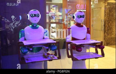 Kathmandu, Nepal. 24th Aug, 2018. Robots are seen in standby position for customer service at Naulo Restaurant, an automated restaurant in Kathmandu, Nepal, Aug. 24, 2018. Credit: Sunil Sharma/Xinhua/Alamy Live News Stock Photo