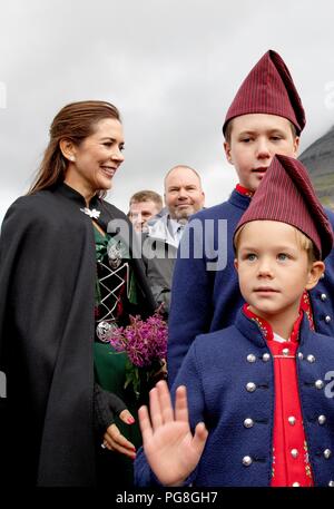 Faroe Islands. 24th Aug, 2018. Crown Princess Mary, Prince Christian and Prince Vincent of Denmark walk from the harbour to the centre of Klaksv?k, on August 24, 2018, on the 2nd of the 4 days visit to the Faroe Islands Photo : Albert Nieboer/ Netherlands OUT/Point de Vue OUT | Credit: dpa picture alliance/Alamy Live News Stock Photo