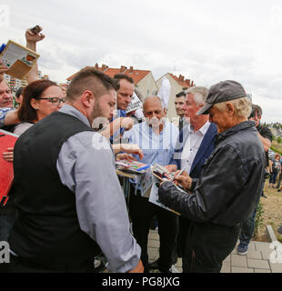 Worms, Germany. 24th August 2018. Terence Hill sign s his autograph for his fans. Italian actor Terence Hill visited the German city of Worms, to present his new movie (My Name is somebody). Terence Hill added the stop in Worms to his movie promotion tour in Germany, to visit a pedestrian bridge, that is unofficially named Terence-Hill-Bridge (officially Karl-Kubel-Bridge). Stock Photo