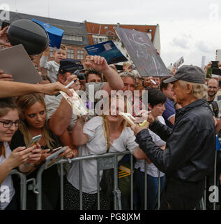 Worms, Germany. 24th August 2018. Terence Hill sign s his autograph for his fans. Italian actor Terence Hill visited the German city of Worms, to present his new movie (My Name is somebody). Terence Hill added the stop in Worms to his movie promotion tour in Germany, to visit a pedestrian bridge, that is unofficially named Terence-Hill-Bridge (officially Karl-Kubel-Bridge). Stock Photo