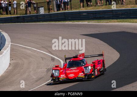 Bowmanville, CAN., 08 Jul 2018. 8th July, 2018. The number 99 ORECA LMP2, driven by the team of Misha Goikhberg and Stephen Simpson, in the Prototype series, enters the sweeping right of turn 1 on 08 of July, 2018 at Canadian Tire Motorsport Park during the Mobil 1 SportsCar Grand Prix weekend. Credit: Victor Biro/ZUMA Wire/Alamy Live News Stock Photo