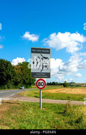 Sign of speed limit  reduced to 80 km/hour and radar speed check, France Stock Photo