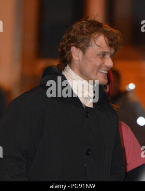 Outlander star Sam Heughan (plays the charachter of Jamie Fraser) meets and geets fans whilst filming in St Andrew's Square in Glasgow for the up and  Stock Photo