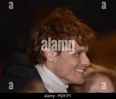 Outlander star Sam Heughan (plays the charachter of Jamie Fraser) meets and geets fans whilst filming in St Andrew's Square in Glasgow for the up and  Stock Photo