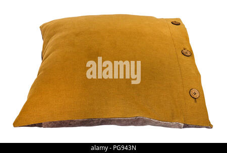 back side of handmade dark yellow (mustard color) decorative pillow isolated on white background Stock Photo