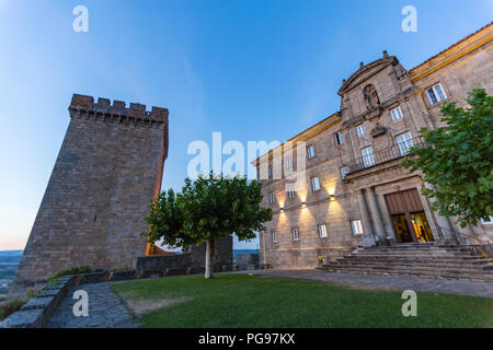 Castle tower and Facade of Parador de Monforte de Lemos at dusk, Lugo province, Galicia, Spain Stock Photo