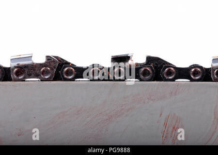 Chainsaw sword dirty and stained like blood isolated on white. Stock Photo