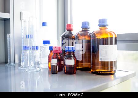Laboratory solutions and glassware. Stock Photo