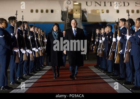 Vice President Mike Pence and Mrs. Karen Pence disembark Air Force Two at Yokota Air Base, Tuesday, February 6, 2018, and are greeted by U.S. Ambassador to Japan, Bill Hagerty and his wife Chrissy Hagerty, Masahisa Sato, Japanese State Minister for foreign affairs, Lt Gen. Jerry Martinez, Commander of the U.S. Force of Japan and his wife Kim Martinez and Col. Kenneth Moss, Commander of Yokota Air Base and his wife Molly Moss, in Tokyo, Japan. Vice President Pence's Trip to Asia Stock Photo