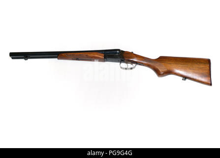 Double Barrel Shotgun, Side by Side Gun with Blued Barrels and Wooden Stock on White Background Stock Photo