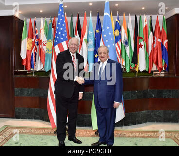 Under Secretary for Political Affairs Thomas Shannon poses for a photo with Tashkent Foreign Minister Abdulaziz Kamilov in Tashkent, Uzbekistan on March 26, 2018. Stock Photo