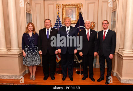 U.S. Secretary of State Mike Pompeo poses for a photo President Donald J. Trump, Vice President Mike Pence, his wife Susan and son Nicholas before his swearing-in ceremony at the U.S. Department of State in Washington, D.C., on May 2, 2018. Stock Photo