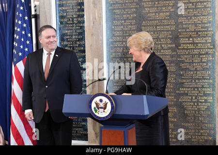 American Foreign Service Association (AFSA) President Ambassador Barbara Stephenson introduces U.S. Secretary of State Mike Pompeo to deliver remarks at the AFSA Memorial Plaque Ceremony at the U.S. Department of State in Washington, D.C., on May 4, 2018. The Ceremony honors those who have lost their lives while serving overseas due to circumstances distinctive to the Foreign Service, including acts of violence or terrorism. Stock Photo