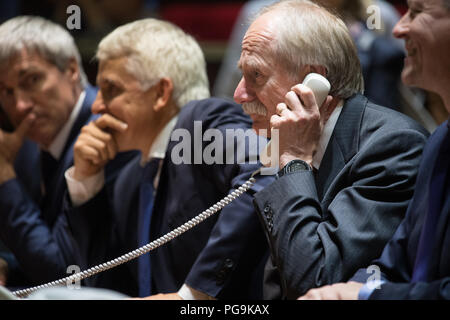 NASA Associate Administrator for the Human Exploration and Operations Mission Directorate William Gerstenmaier speaks with the Soyuz MS-09 crew from the Moscow Mission Control Center in Korolev, Russia a few hours after the Soyuz MS-09 docked to the International Space Station on Friday, June 8, 2018. Hatches were opened at 11:17am EDT (6:17pm Moscow time) and Sergey Prokopyev of Roscosmos, Serena Auñón-Chancellor of NASA, and Alexander Gerst of ESA (European Space Agency) joined Expedition 56 Commander Drew Feustel of NASA, Ricky Arnold of NASA, and Oleg Artemyev of Roscosmos onboard the orbi Stock Photo