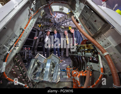 NASA Orion AA-2 Crew Module Manager Dr. Jon Olansen, left, NASA Administrator Jim Bridenstine, NASA Johnson Space Center Director Mark Geyer, and Orion Program Manager Mark Kirasich, right, are seen inside the Orion test crew capsule for the Ascent Abort-2 (AA-2) test, Thursday, Aug. 2, 2018 at NASA’s Johnson Space Center in Houston, Texas. Stock Photo