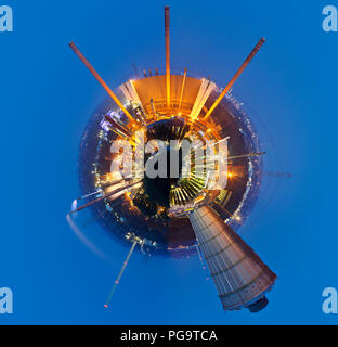 Little planet created from a heavy industry panorama of a coking plant at night. Stock Photo
