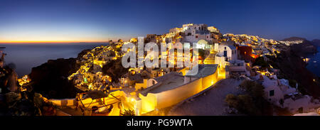 Panoramic night view at the tip of Oia in Santorini, Greece. Stock Photo