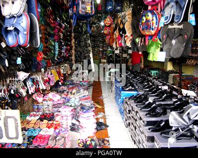 ANTIPOLO CITY, PHILIPPINES - AUGUST 16, 2018: Assorted footwear on display at a shoe store. Stock Photo