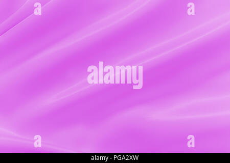 Smooth elegant shiny magenta silk or satin luxury cloth texture can use as abstract holidays background. Luxurious Christmas background or New Year ba Stock Photo