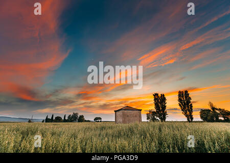 Catalonia, Spain. Spring Sunset Sky Above Spanish Countryside Rural Wheat Field Landscape. Lonely Barn Farm Building Farmhouse Under Scenic Dramatic S Stock Photo