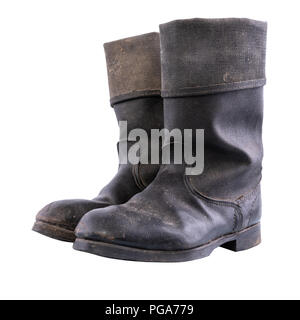 Retro boots - Kirza boots on white background, used in Soviet Union for soldiers in the army and for work, retro boots made of artificial leather Stock Photo