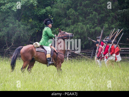 MCCONNELLS, SC (USA) - July 14, 2018:  Revolutionary War reenactors in British uniforms recreate the Battle of Huck’s Defeat at Historic Brattonsville Stock Photo