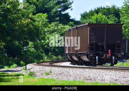 Princeton, Illinois, USA.  A tail end of a Burlington Northern Santa Fe freight train made up of empty coal cars passing through Princeton. Stock Photo