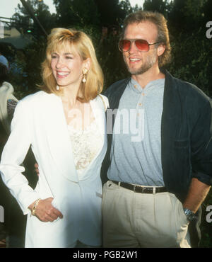 LEEZA GIBBONS with Stephen Meadows at T.V. Cares 1996.(Credit Image ...