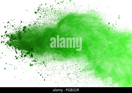 Freeze motion of Green powder exploding on white background. Stock Photo