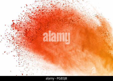 Abstract of colored powder explosion on white background. Orange powder splatted isolate. Colorful cloud. Colored dust e Stock Photo