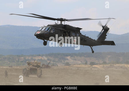 A first cavalry soldier prepares a UH-1B helicopter for a ...