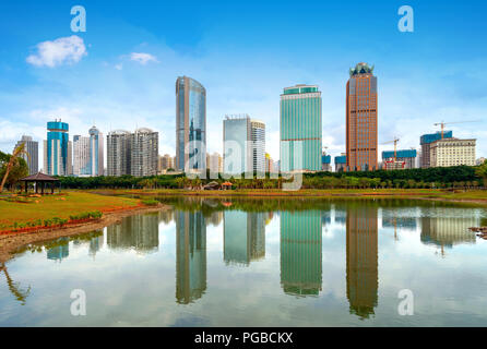 China Haikou Cityscape, high-rise by the lake. Stock Photo