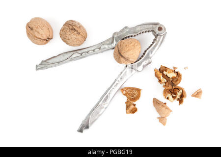 Nutcracker and walnuts isolated on a white background Stock Photo