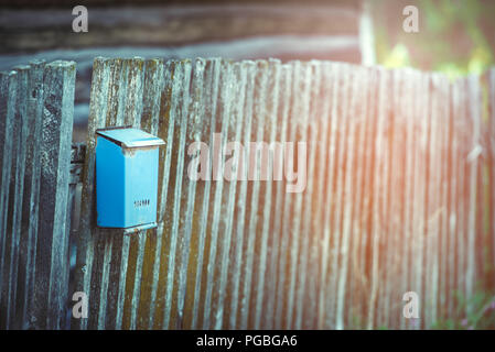 Mailbox on the wooden fence, vintage Stock Photo