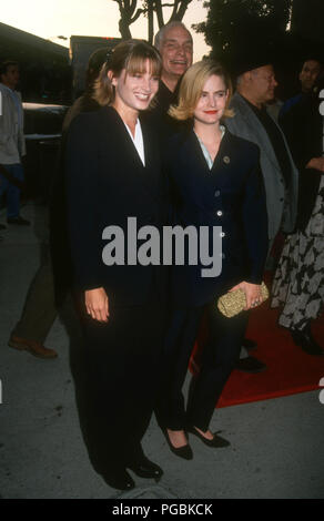 WESTWOOD, CA - AUGUST 6: (L-R) Actress Bridget Fonda, director Barbet Schroeder and actress Jennifer Jason Leigh attend Columbia Pictures' 'Single White Female' Westwood Premiere on August 6, 1992 at Mann National Theatre in Westwood, California. Photo by Barry King/Alamy Stock Photo Stock Photo