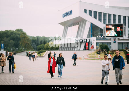 Minsk, Belarus- June 28, 2017: People Walking On Street Near Minsk Sports Palace In Summer Day. Stock Photo