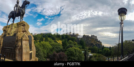 Edinburgh, United Kingdom - July 27, 2018: Royal Scots Greys Memorial in Edinburgh, Scotland, with the Edinburgh Castle in the background on a summer  Stock Photo