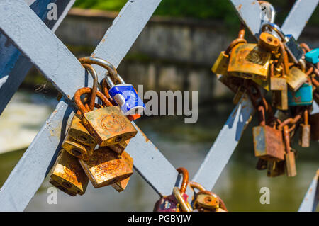 CLUJ-NAPOCA, ROMANIA - JULY 29, 2018: love padlocks on  Elizabeta Bridge railing  on Somes River in Cluj, Transylvania Stock Photo